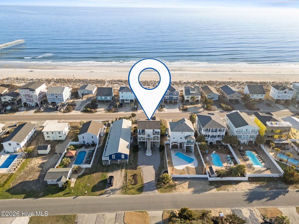 Photo of 1116 E Beach Drive, Oak Island, NC 28465 (MLS # 100558886)
