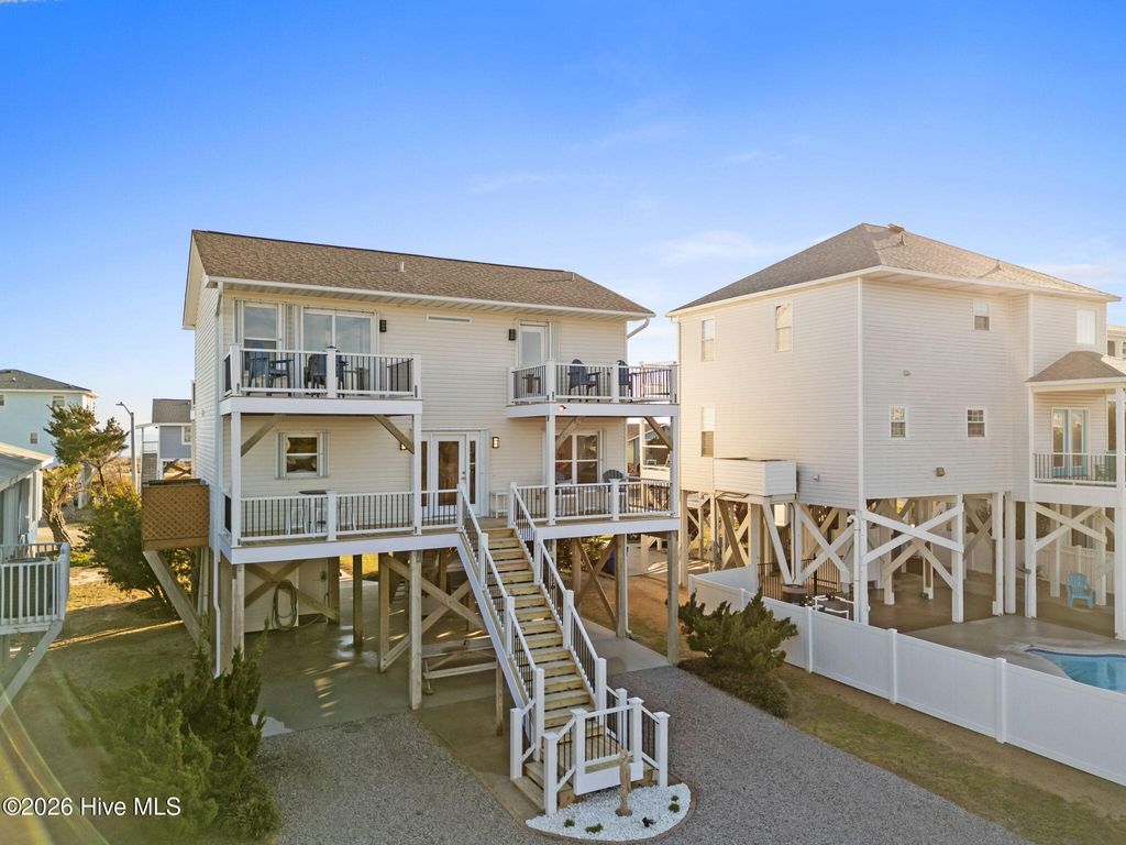 Photo of 1116 E Beach Drive, Oak Island, NC 28465 (MLS # 100558886)