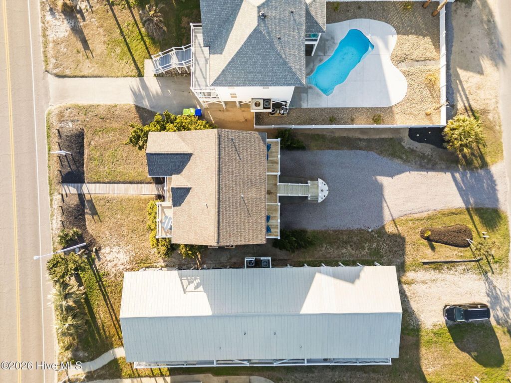Photo of 1116 E Beach Drive, Oak Island, NC 28465 (MLS # 100558886)