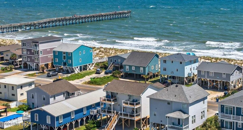 Photo of 1116 E Beach Drive, Oak Island, NC 28465 (MLS # 100558886)