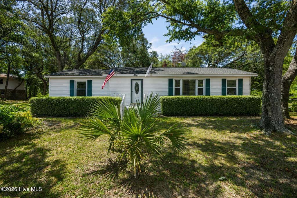 Photo of 3701 E Oak Island Drive, Oak Island, NC 28465 (MLS # 100595942)