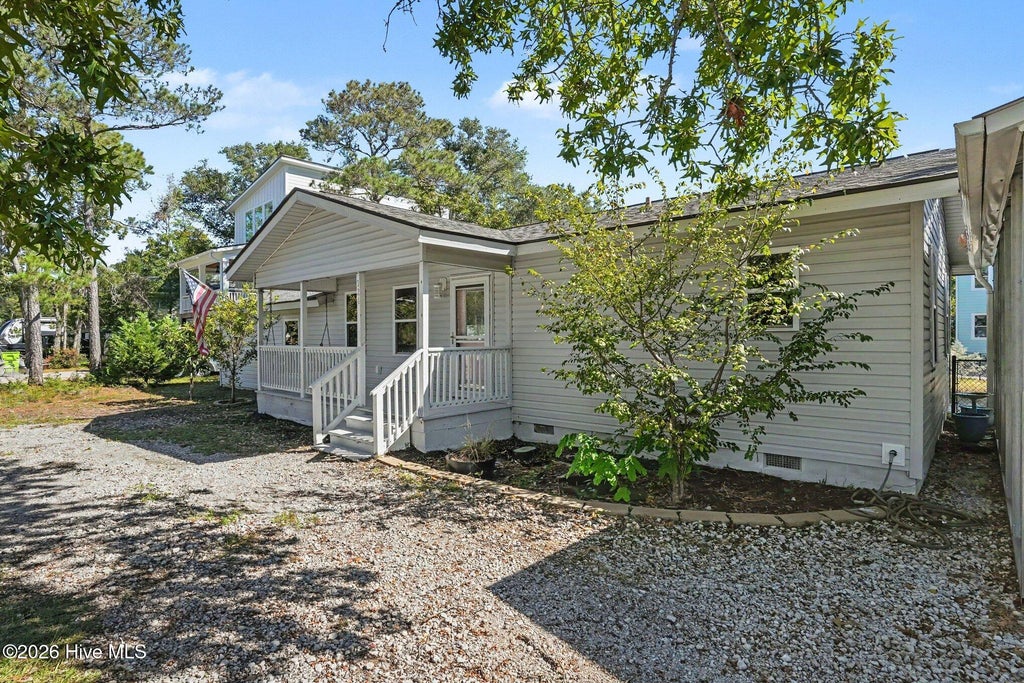 Photo of 124 N Middleton Avenue, Oak Island, NC 28465 (MLS # 100610145)