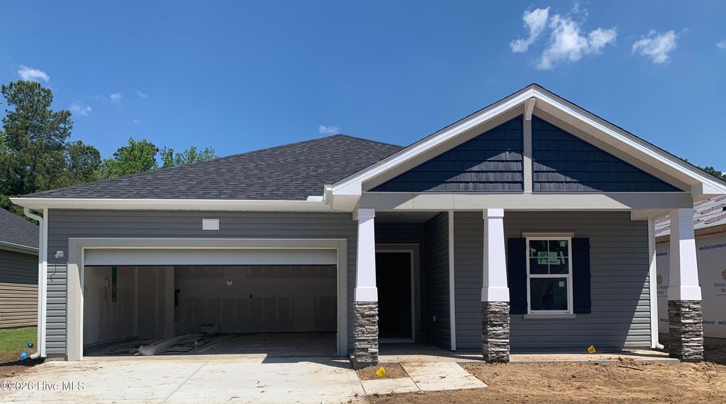 Photo of 7127 Woodline Drive SW, Sunset Beach, NC 28468 (MLS # 100564822)