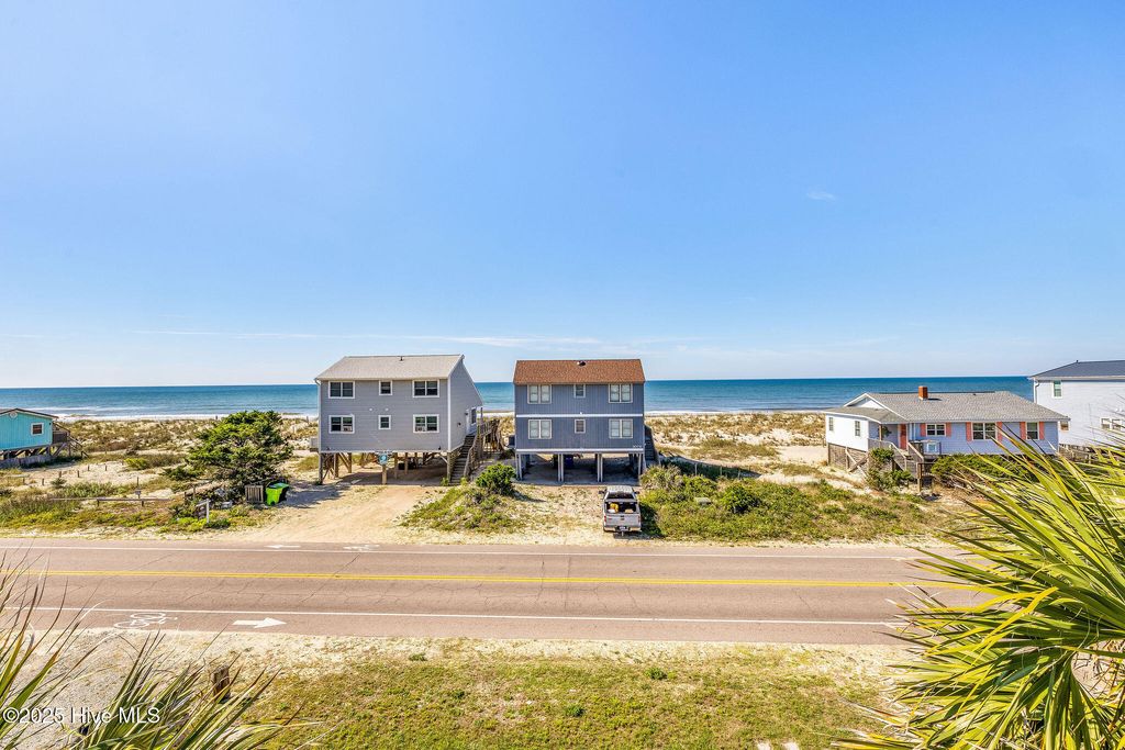 Photo of 308 E Beach Drive, Oak Island, NC 28465 (MLS # 100509917)