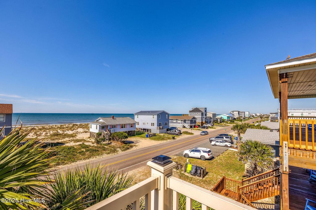 Photo of 308 E Beach Drive, Oak Island, NC 28465 (MLS # 100509917)