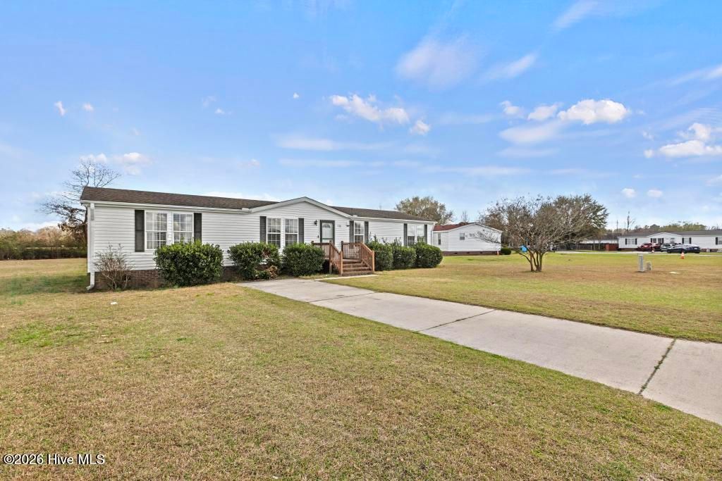 Photo of 126 Rainmaker Drive, Jacksonville, NC 28540 (MLS # 100561746)