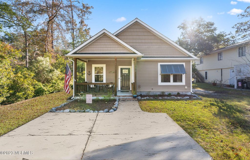 Photo of 130 NW 23rd Street, Oak Island, NC 28465 (MLS # 100568297)