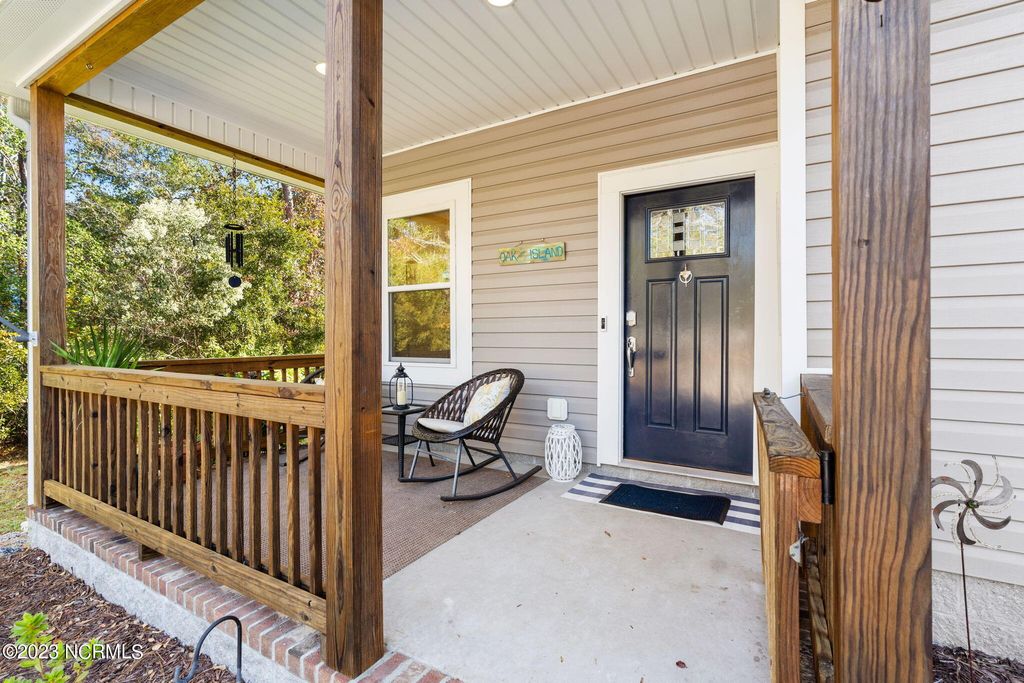 Photo of 130 NW 23rd Street, Oak Island, NC 28465 (MLS # 100568297)