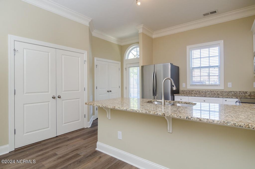 Photo of 4954 Exton Park Loop, Castle Hayne, NC 28429 (MLS # 100572509)