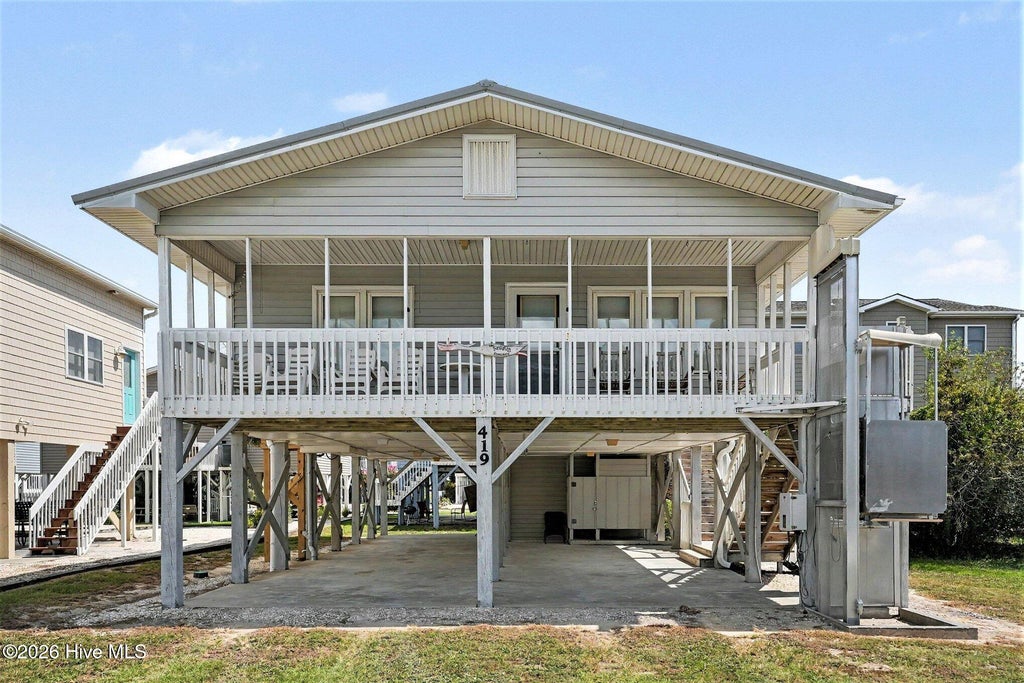 Photo of 419 1st Street, Sunset Beach, NC 28468 (MLS # 100605870)