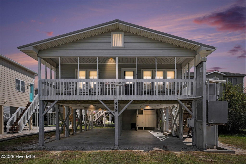 Photo of 419 1st Street, Sunset Beach, NC 28468 (MLS # 100605870)