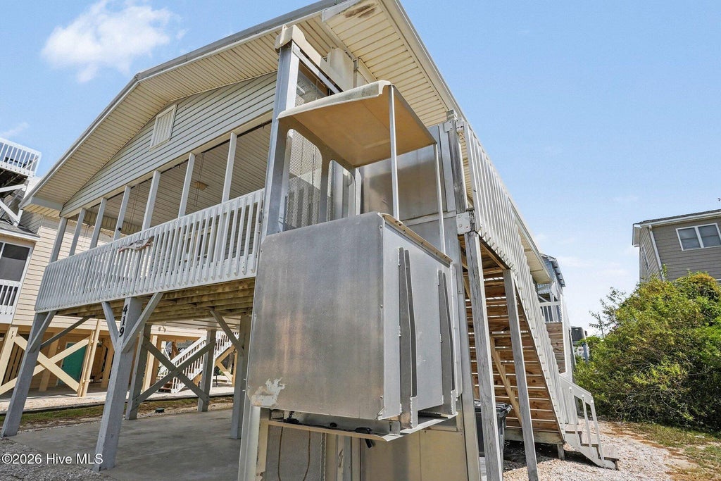 Photo of 419 1st Street, Sunset Beach, NC 28468 (MLS # 100605870)