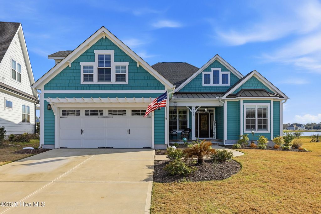 Photo of 566 Moss Lake Lane, Holly Ridge, NC 28445 (MLS # 100562298)