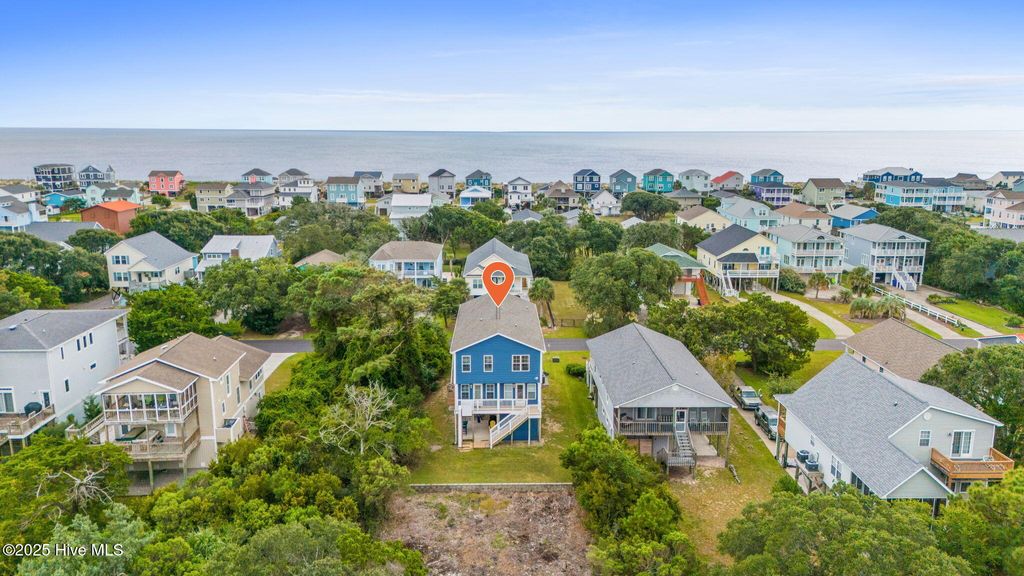 Photo of 2216 E Pelican Drive, Oak Island, NC 28465 (MLS # 100532717)