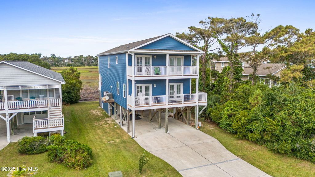 Photo of 2216 E Pelican Drive, Oak Island, NC 28465 (MLS # 100532717)