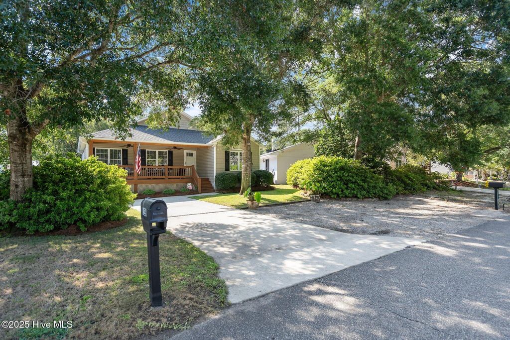 Photo of 126 NW 5th Street, Oak Island, NC 28465 (MLS # 100516795)