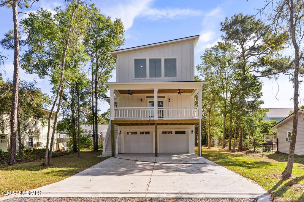 Photo of 126 N Middleton Avenue, Oak Island, NC 28465 (MLS # 100549617)