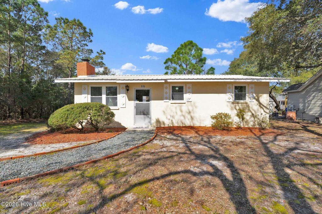 Photo of 115 NE 14th Street, Oak Island, NC 28465 (MLS # 100562337)