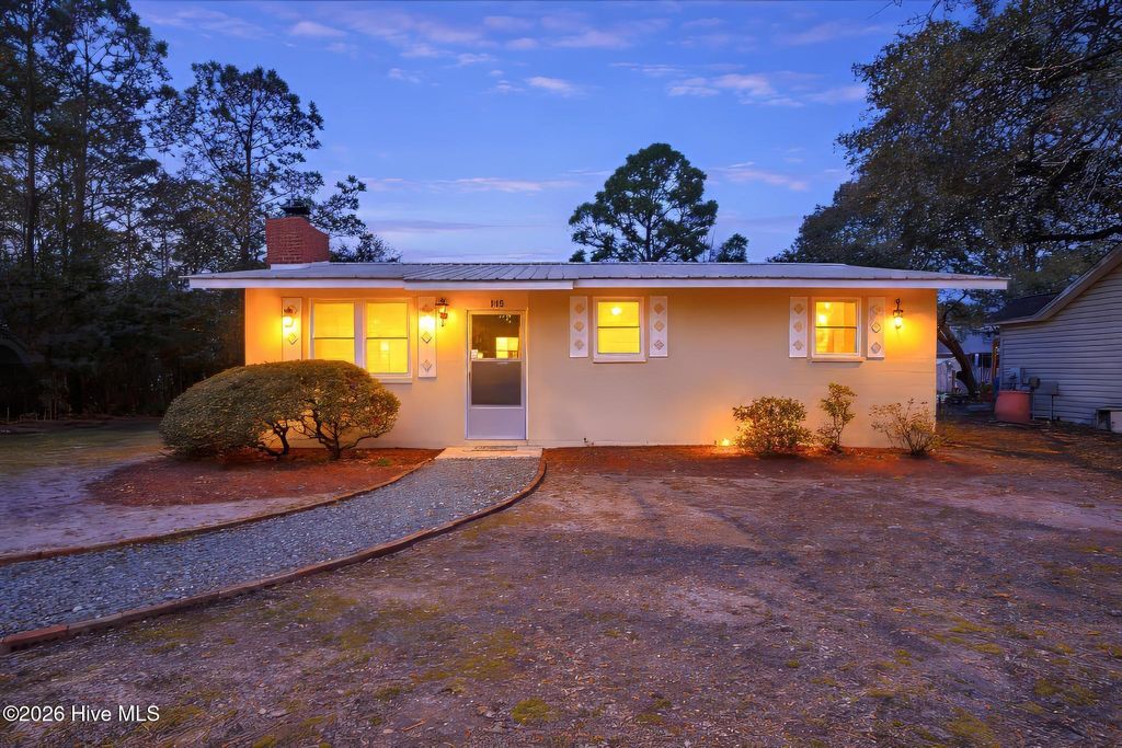 Photo of 115 NE 14th Street, Oak Island, NC 28465 (MLS # 100562337)