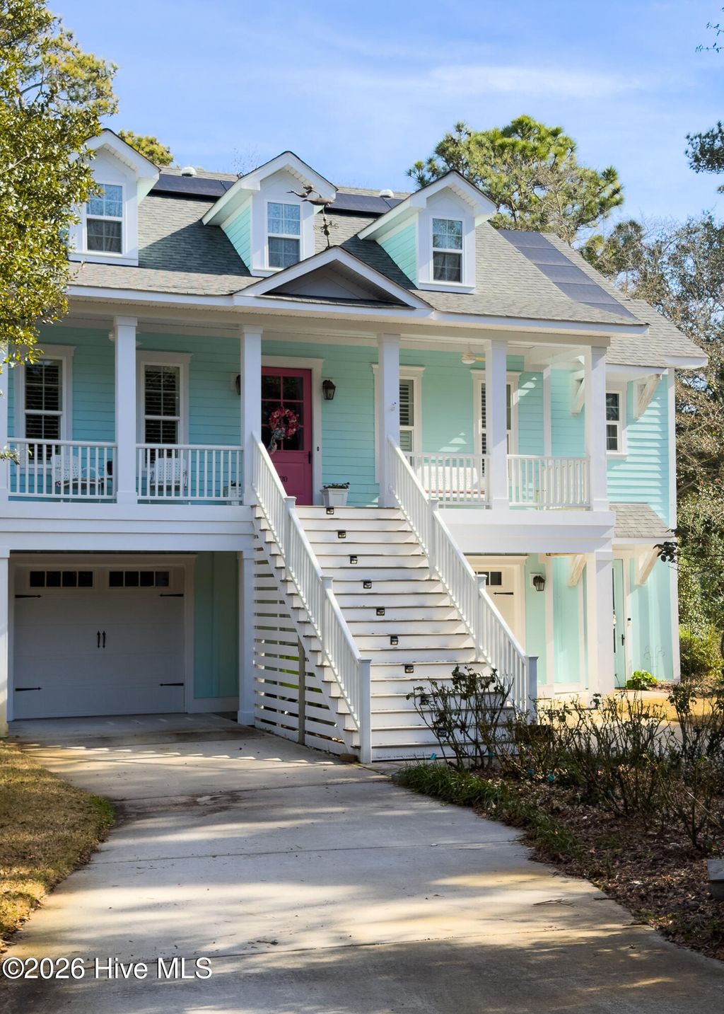 Photo of 730 Alyssum Avenue, Oak Island, NC 28465 (MLS # 100550882)