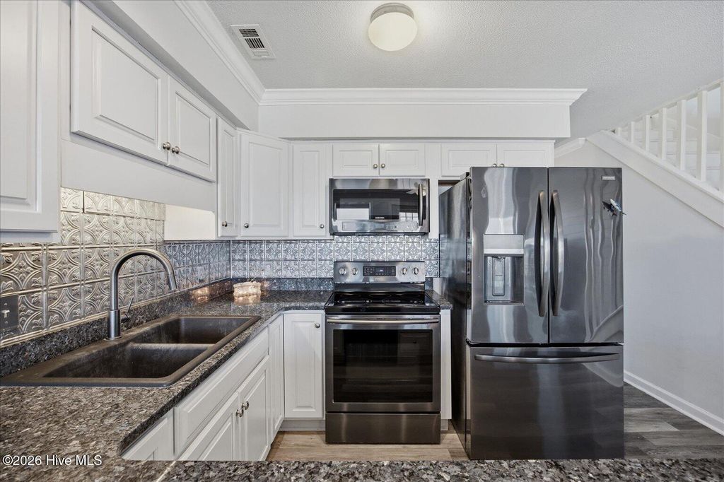 Photo of 3 Bermuda Landing Place, North Topsail Beach, NC 28460 (MLS # 100570154)