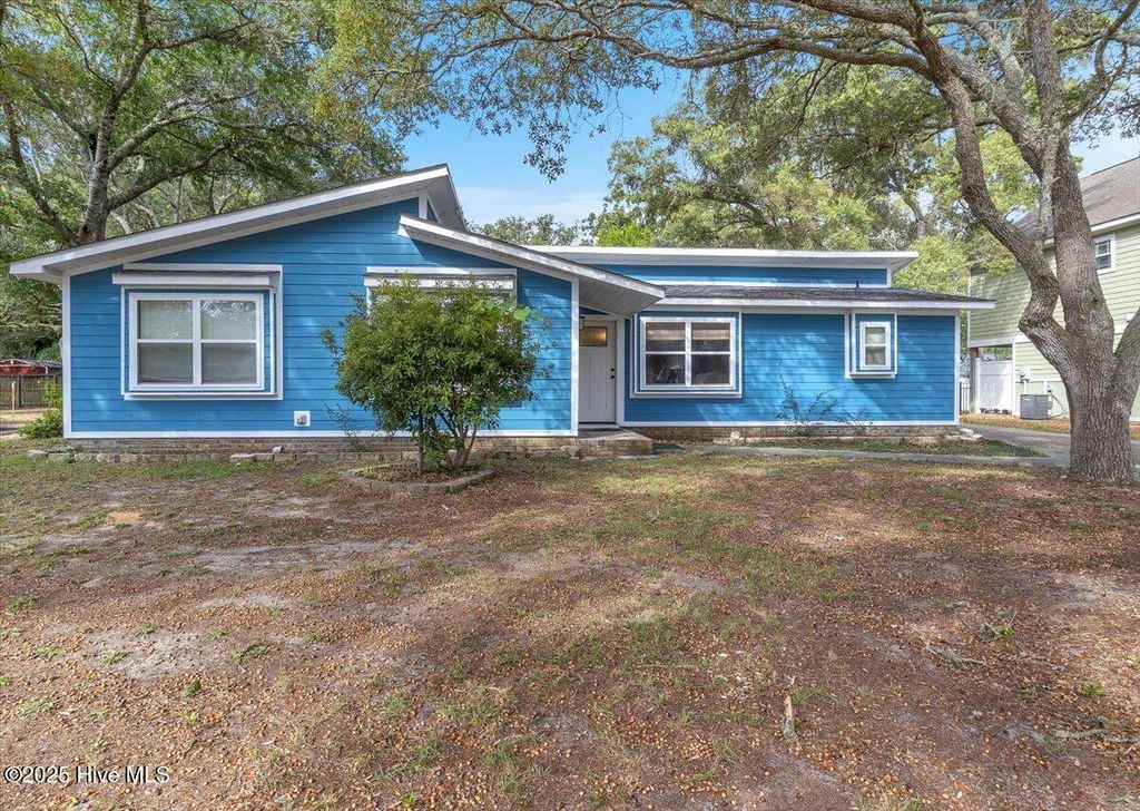 Photo of 209 NE 56th Street, Oak Island, NC 28465 (MLS # 100535425)