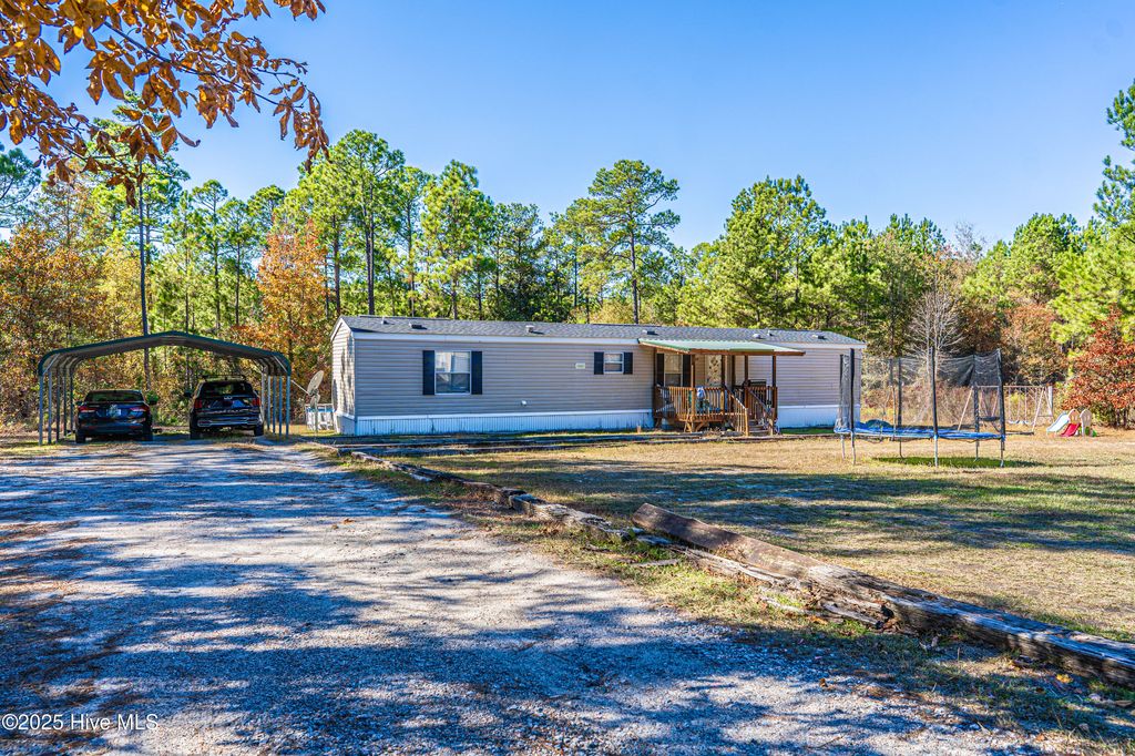 Photo of 408 Wiregrass Road, Rockingham, NC 28379 (MLS # 100544571)