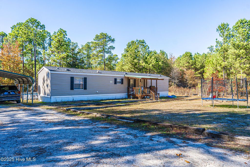 Photo of 408 Wiregrass Road, Rockingham, NC 28379 (MLS # 100544571)