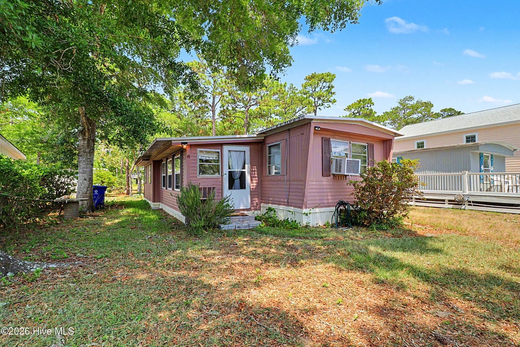 Photo of 131 NE 75th Street, Oak Island, NC 28465 (MLS # 100584272)