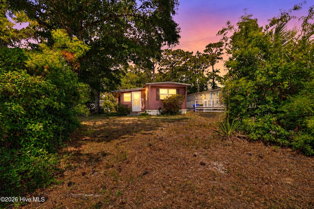 Photo of 131 NE 75th Street, Oak Island, NC 28465 (MLS # 100584272)