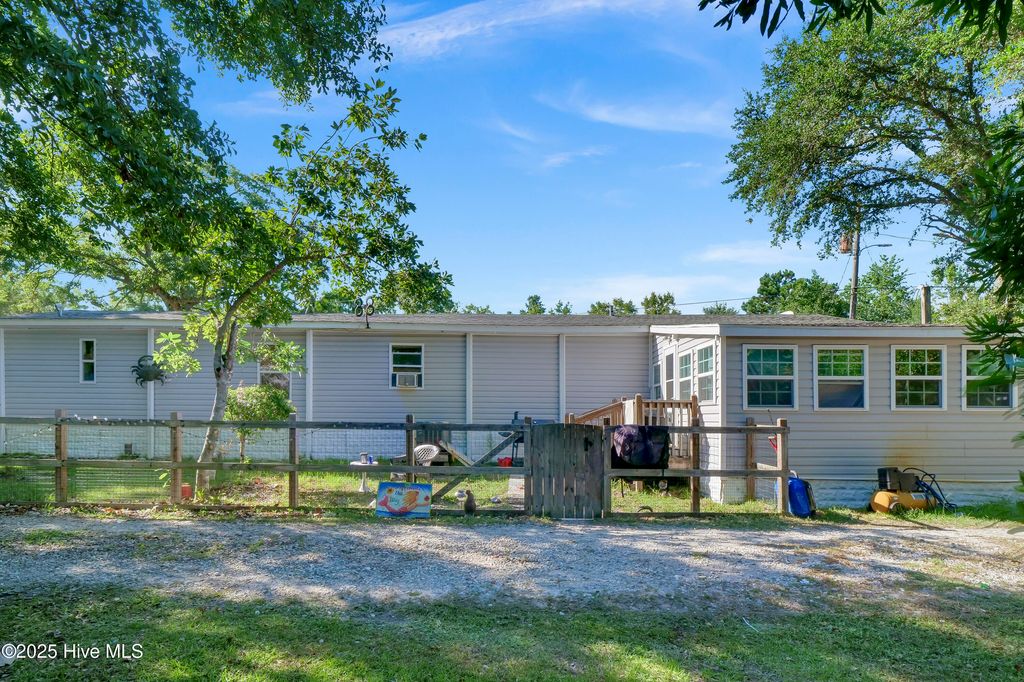 Photo of 215 Anderson Drive, Hampstead, NC 28443 (MLS # 100522648)