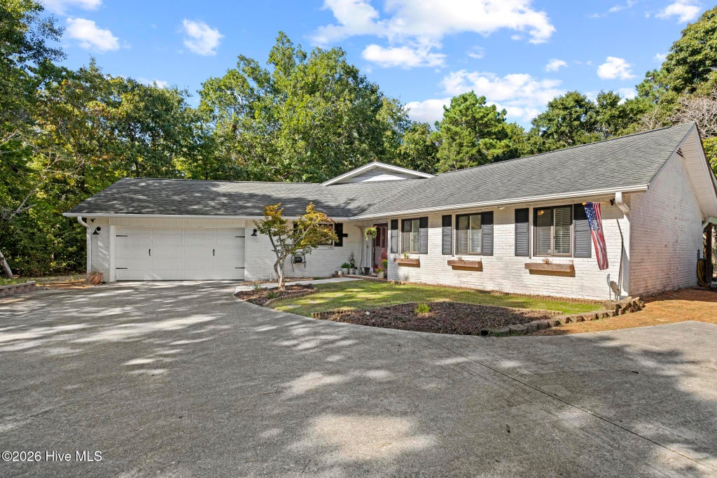 Photo of 216 Hickory Lane, Hampstead, NC 28443 (MLS # 100604909)
