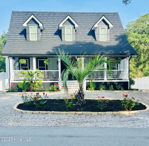 Photo of 427 Womble Street, Oak Island, NC 28465 (MLS # 100582473)
