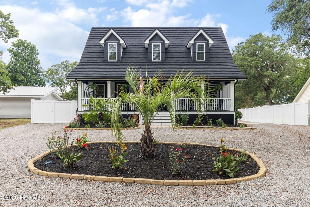 Photo of 427 Womble Street, Oak Island, NC 28465 (MLS # 100582473)