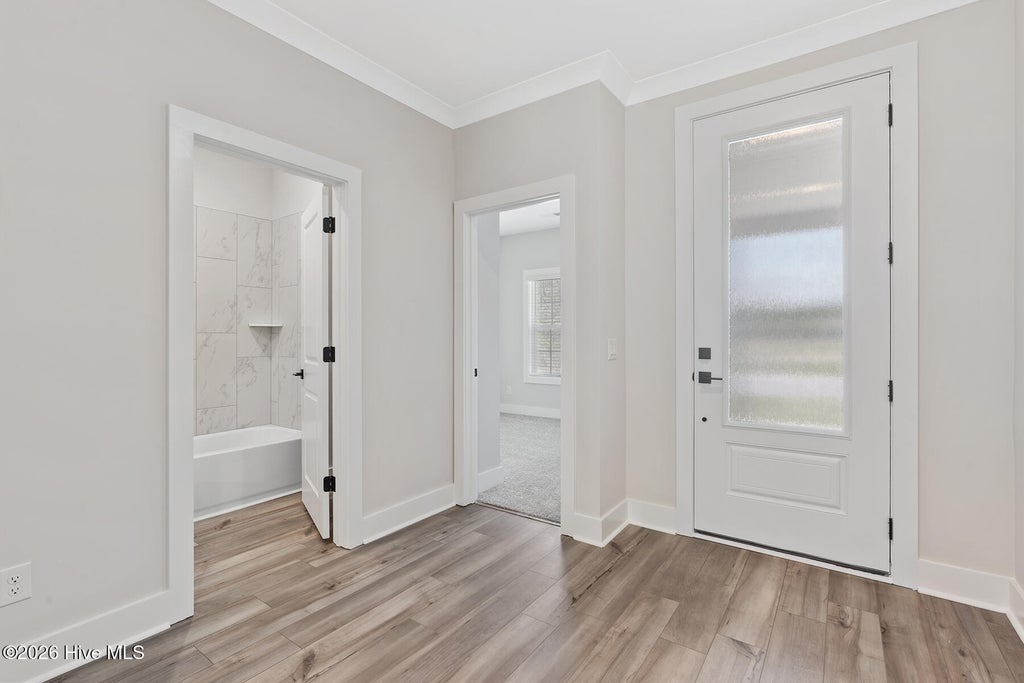 Photo of 210 S Umbrella Palm Drive, Hampstead, NC 28443 (MLS # 100570170)