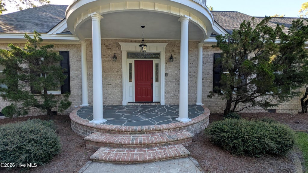 Photo of 6465 Walden Pond Lane, Southport, NC 28461 (MLS # 100603190)