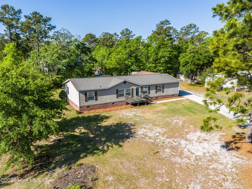 Photo of 130 Topsail Lake Drive, Hampstead, NC 28443 (MLS # 100568101)