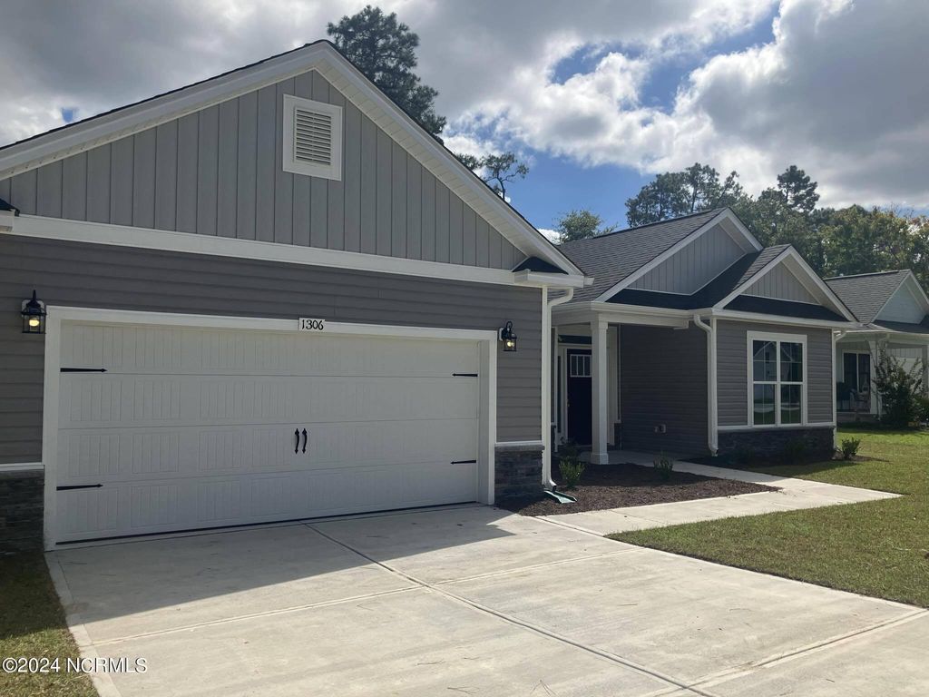 Photo of 1306 Caracara Drive #Model Home, New Bern, NC 28560 (MLS # 100546213)
