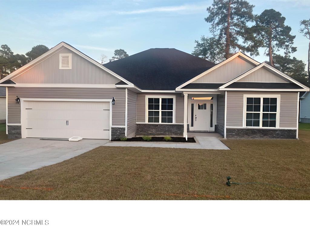 Photo of 1306 Caracara Drive #Model Home, New Bern, NC 28560 (MLS # 100546213)
