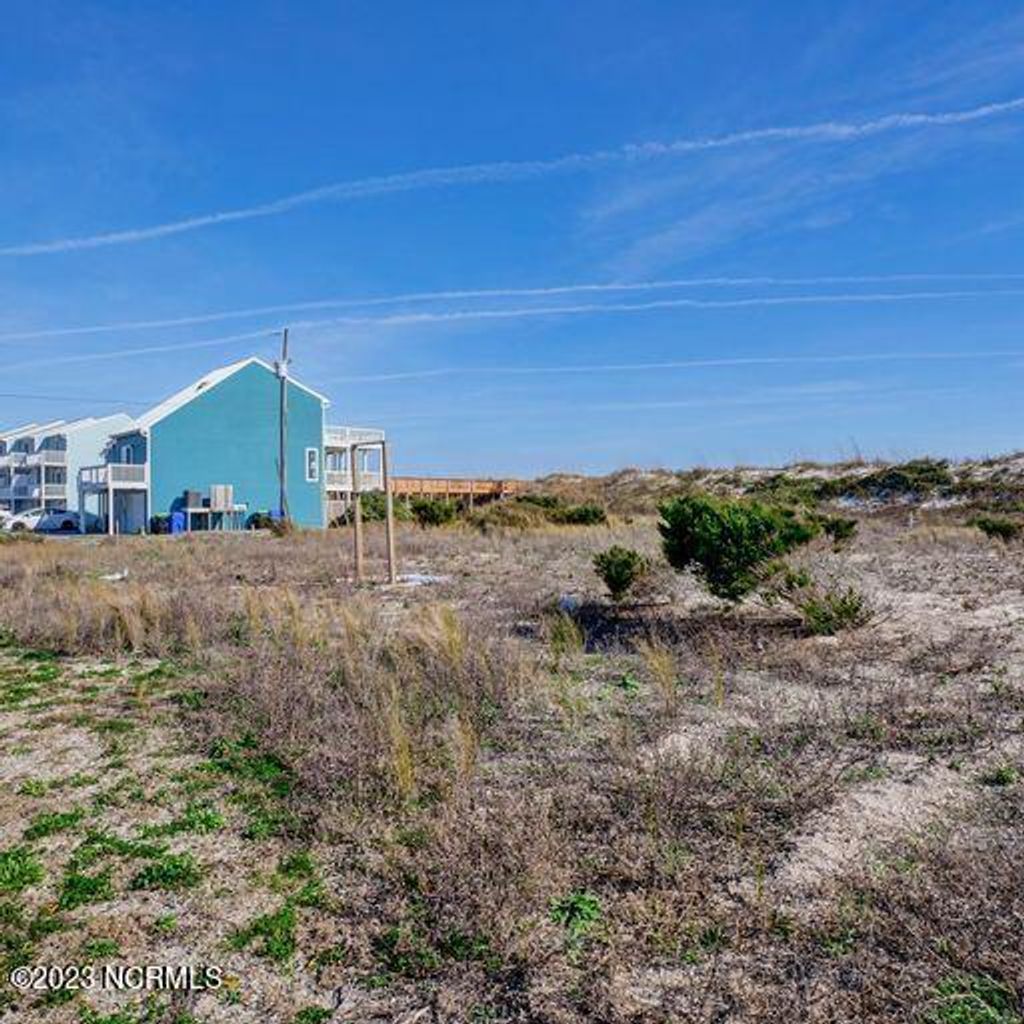 Photo of 1404 New River Inlet Road, North Topsail Beach, NC 28460 (MLS # 100497430)