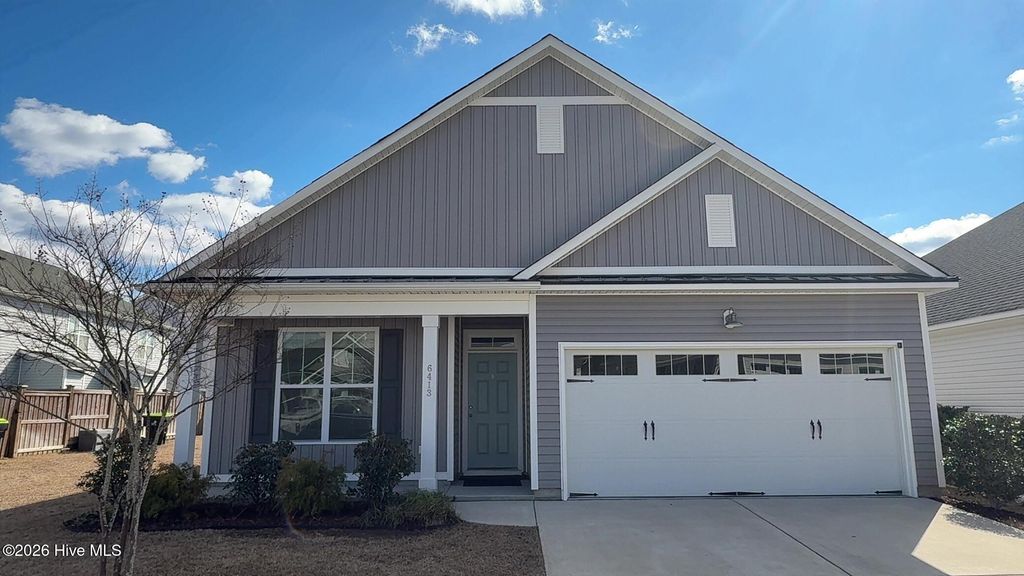 Photo of 6413 Pinnacle Point, Winnabow, NC 28479 (MLS # 100556370)