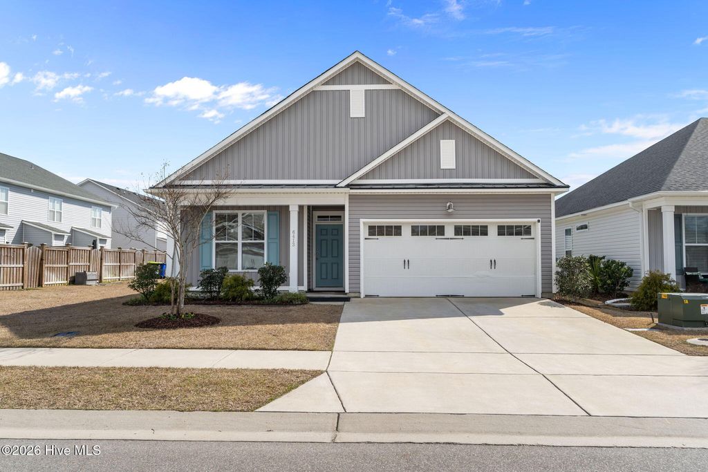 Photo of 6413 Pinnacle Point, Winnabow, NC 28479 (MLS # 100556370)