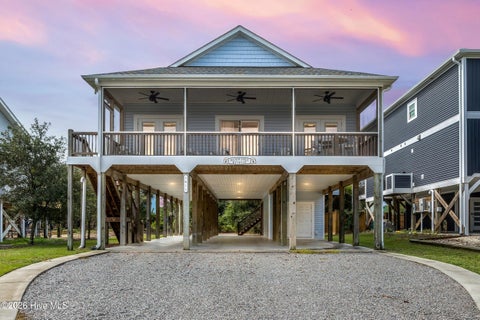 Photo of 1611 E Pelican Drive, Oak Island, NC 28465 (MLS # 100596262)