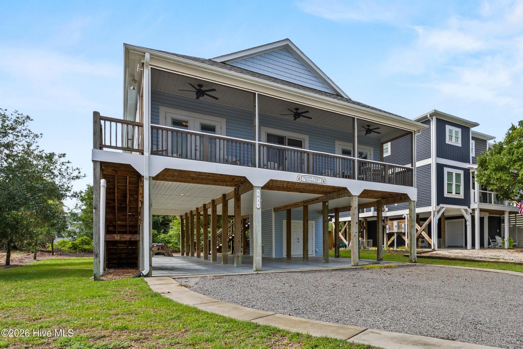 Photo of 1611 E Pelican Drive, Oak Island, NC 28465 (MLS # 100596262)