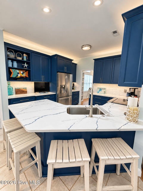 Tiny photo for 301 Wisteria Way, Caswell Beach, NC 28465 (MLS # 100606080)