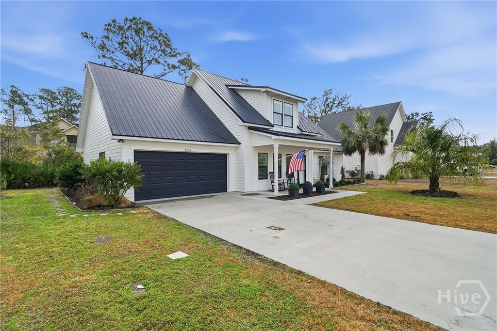 Photo of 1017 Captains Cove Way, St Simons Island, GA 31522 (MLS # SA348409)