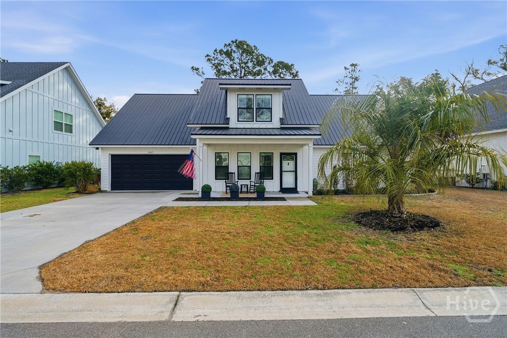 Photo of 1017 Captains Cove Way, St Simons Island, GA 31522 (MLS # SA348409)