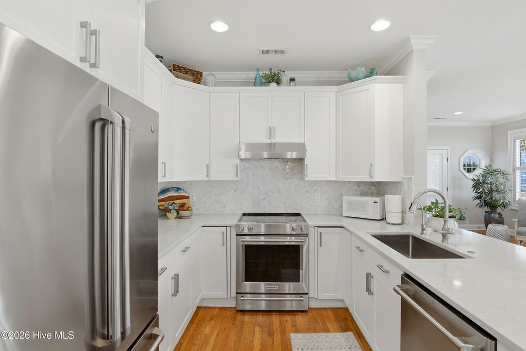 Photo of 221 Silver Sloop Way, Carolina Beach, NC 28428 (MLS # 100559710)