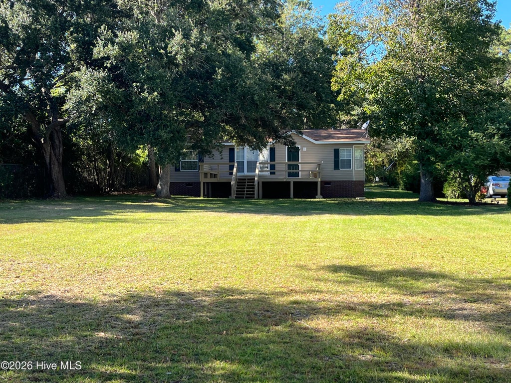 Photo of 720 Bay Harbor Drive, Hampstead, NC 28443 (MLS # 100609691)