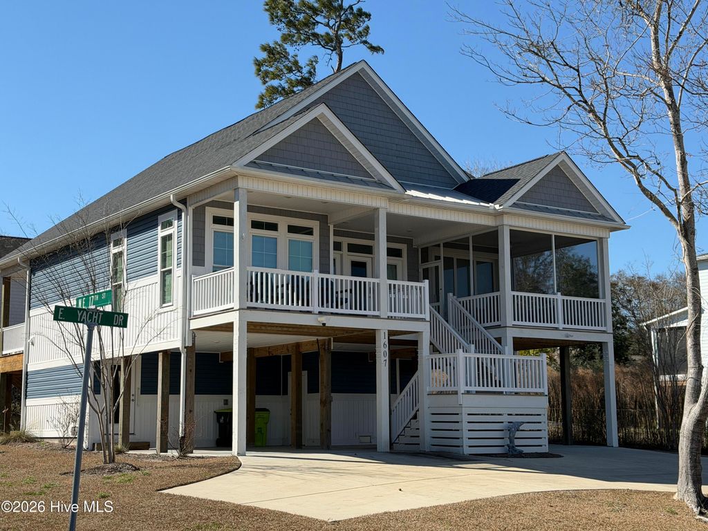 Photo of 1607 E Yacht Drive, Oak Island, NC 28465 (MLS # 100556192)